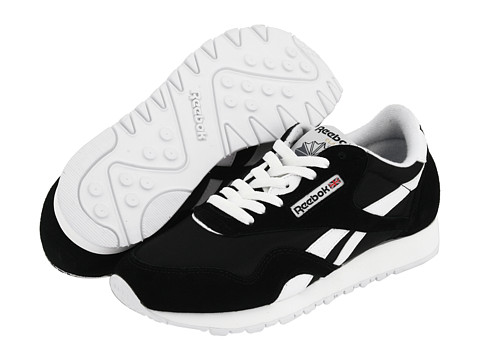 white and black reebok shoes
