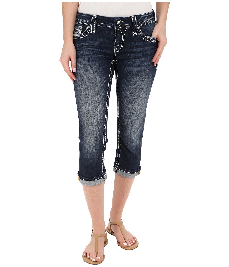 dark blue rock revival jeans